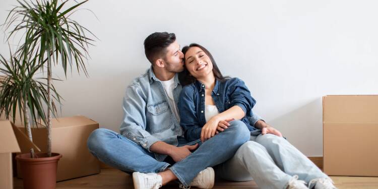 Young couple in their new home